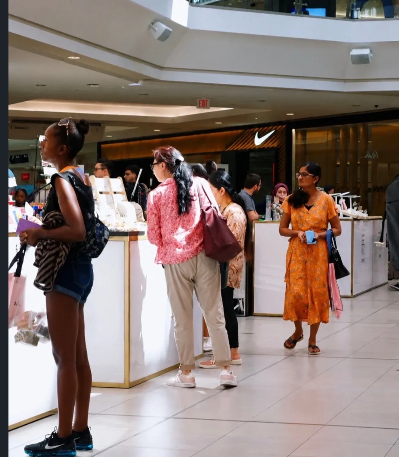 A VBRNT vendor speaking with shoppers